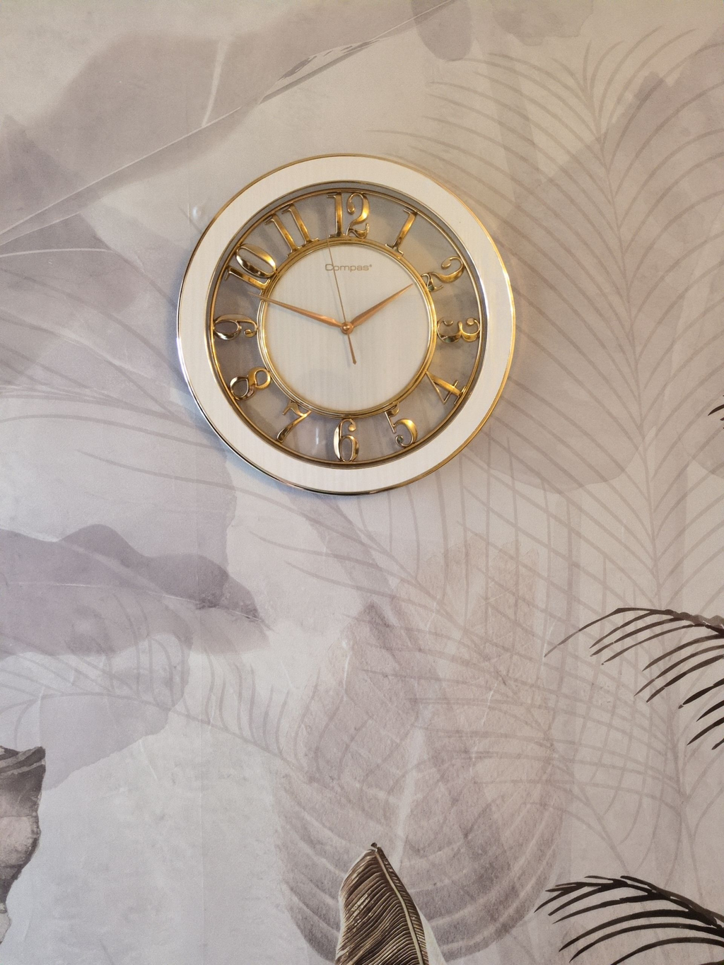 Modern Luxury Wall Clock – Gold Accents with Transparent Frame