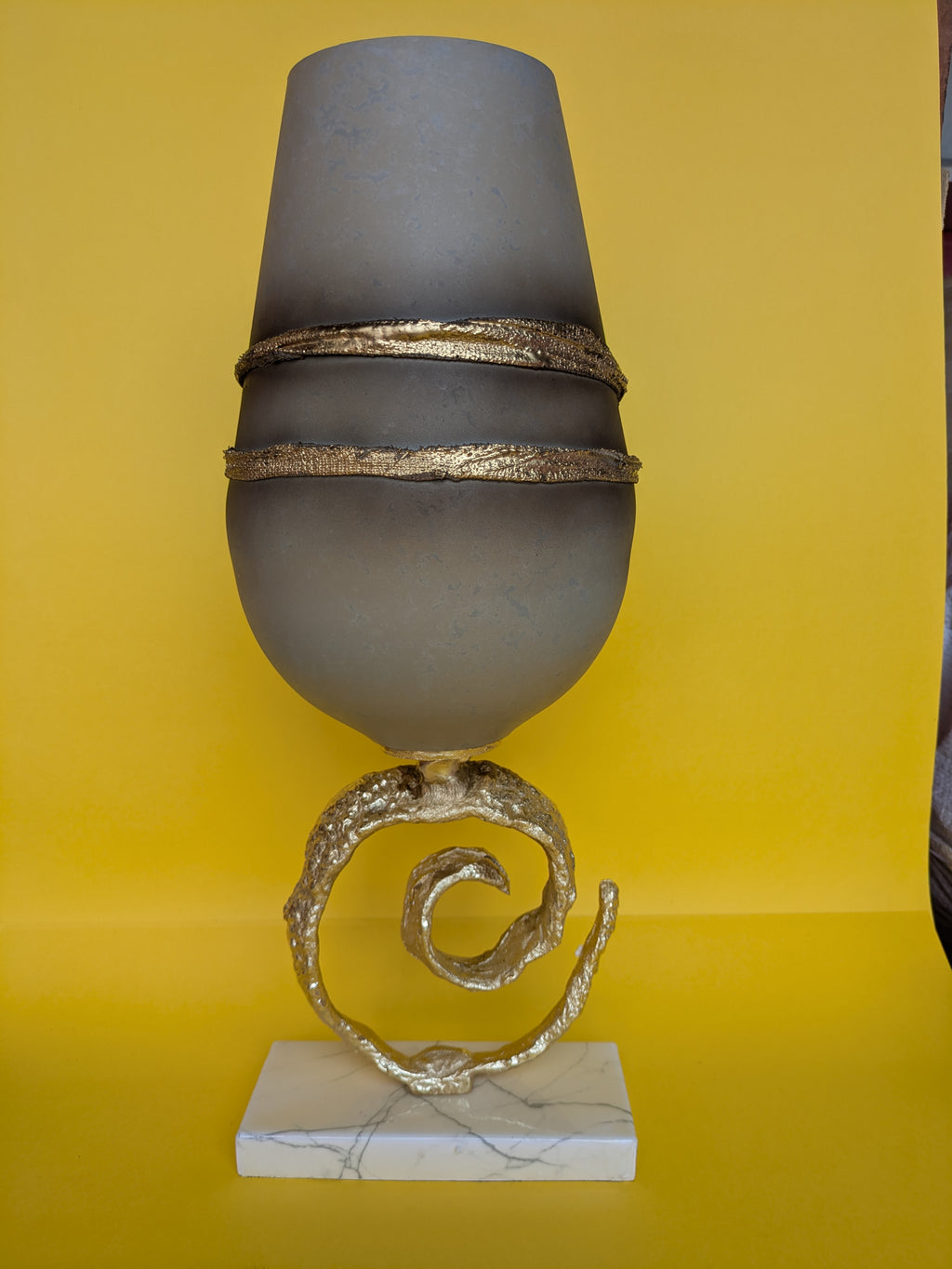 Sculptural Metal Vase with Spiral Base & Marble Stand – Luxe Accent Decor